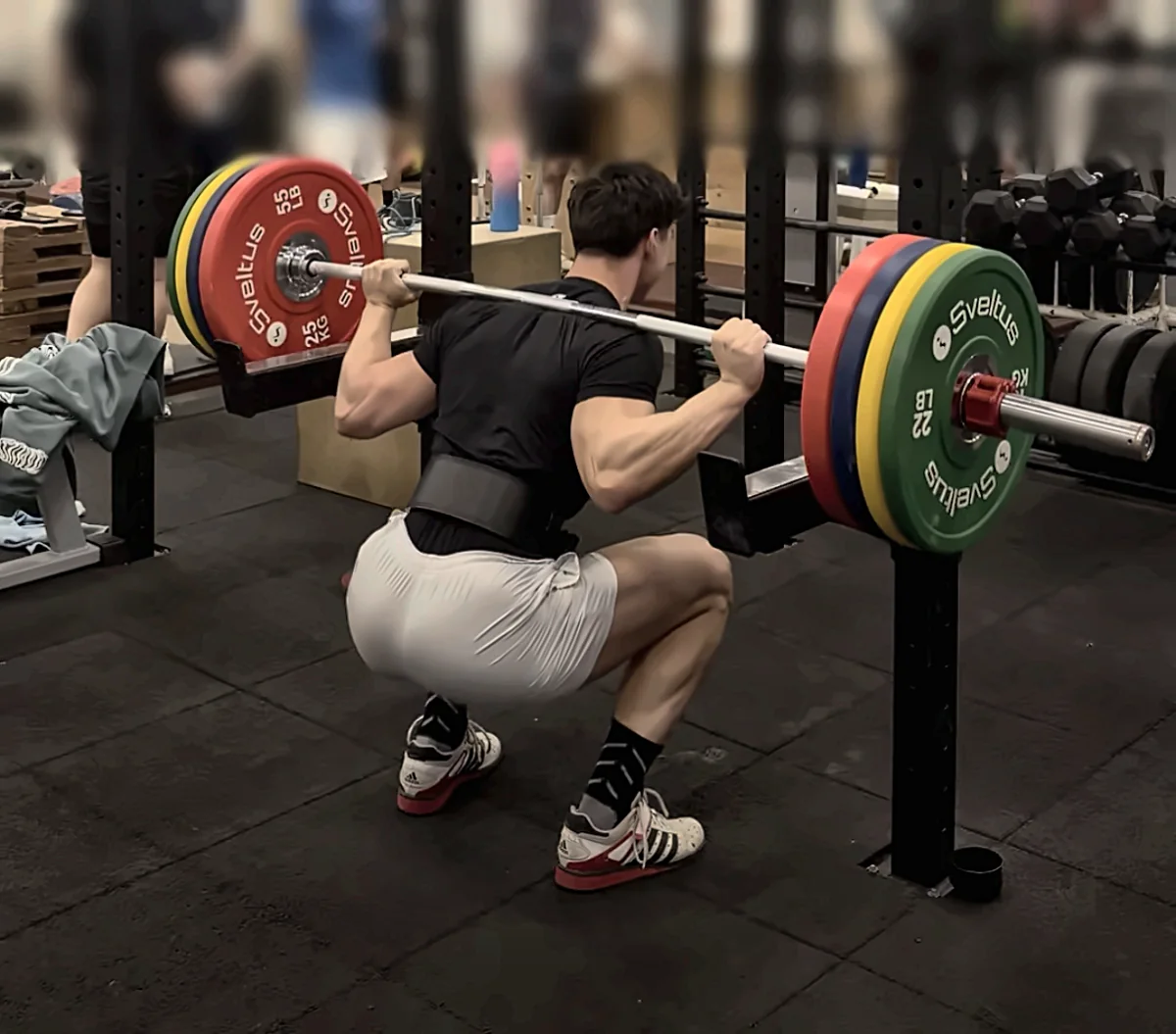 Alliaume Devaugerme au squat barre avec ceinture de force